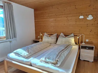 Ein Bett oder Betten in einem Zimmer der Unterkunft Ferienwohnung Helene