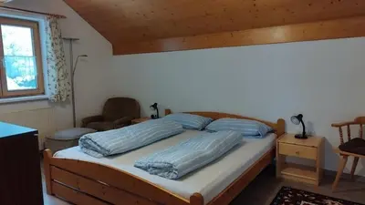 Ein Bett oder Betten in einem Zimmer der Unterkunft Ferienwohnung