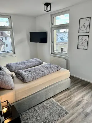 Ein Bett oder Betten in einem Zimmer der Unterkunft Penthouse im Zentrum von Bregenz