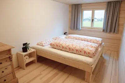 Ein Bett oder Betten in einem Zimmer der Unterkunft Bregenzerwälder Appartements Familie Fink