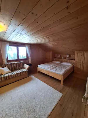 Ein Bett oder Betten in einem Zimmer der Unterkunft Burtscha Lodge