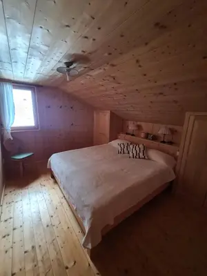 Ein Bett oder Betten in einem Zimmer der Unterkunft Burtscha Lodge