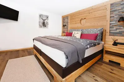 Ein Bett oder Betten in einem Zimmer der Unterkunft Chalet Claudia