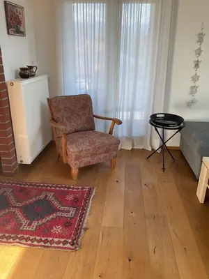 Ein Sitzbereich in der Unterkunft Ferienwohnung am Rhein