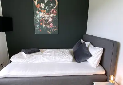 Ein Bett oder Betten in einem Zimmer der Unterkunft Ferienhaus Röns