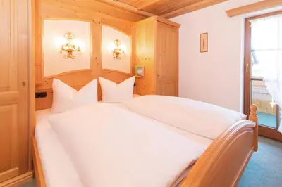 Ein Bett oder Betten in einem Zimmer der Unterkunft Ferienwohnungen Hörmann