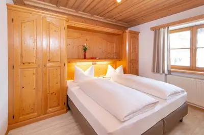 Ein Bett oder Betten in einem Zimmer der Unterkunft Ferienwohnungen Hörmann