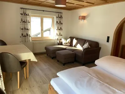 Ein Bett oder Betten in einem Zimmer der Unterkunft Ferienwohnungen Hörmann