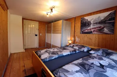 Ein Bett oder Betten in einem Zimmer der Unterkunft Hus8 Krumbach