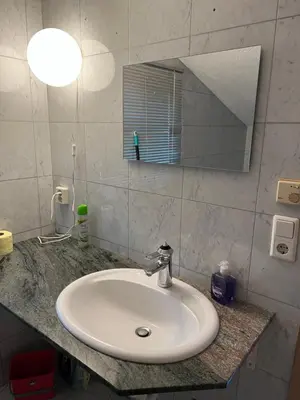 Ein Badezimmer in der Unterkunft OL Apart, free Parking, free Internet, 24 h Checkin