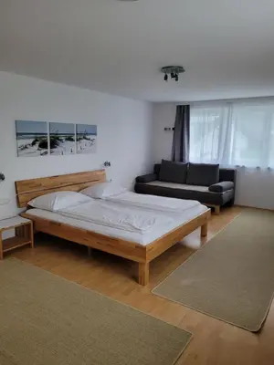 Ein Bett oder Betten in einem Zimmer der Unterkunft Gästezimmer Suppan