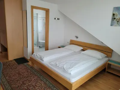 Ein Bett oder Betten in einem Zimmer der Unterkunft Gästezimmer Suppan