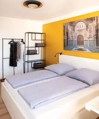 Ein Bett oder Betten in einem Zimmer der Unterkunft Seeblick Bregenz - mit Parkgarage