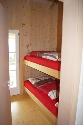 Ein Bett oder Betten in einem Zimmer der Unterkunft Ferienhaus Albrecht