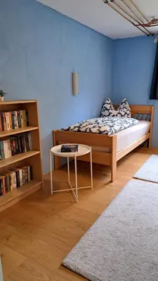 Ein Bett oder Betten in einem Zimmer der Unterkunft Baers Mountain Stay Außerbraz