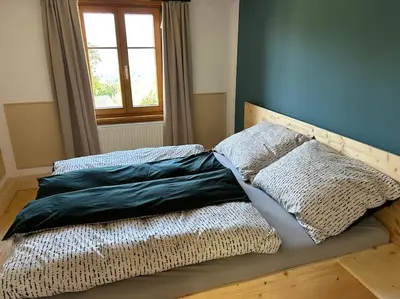 Ein Bett oder Betten in einem Zimmer der Unterkunft Haus Sonnenblick