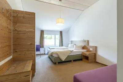 Ein Bett oder Betten in einem Zimmer der Unterkunft Motel Engel - self checkin