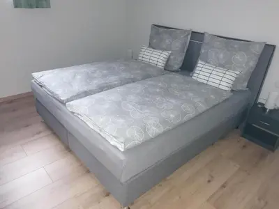 Ein Bett oder Betten in einem Zimmer der Unterkunft Ferienwohnung Ulrike