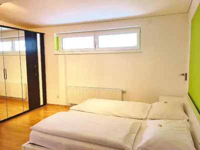 Ein Bett oder Betten in einem Zimmer der Unterkunft Hotel Garni Brigitte