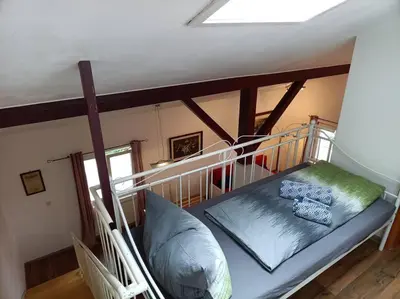 Ein Bett oder Betten in einem Zimmer der Unterkunft Art House by Dimai