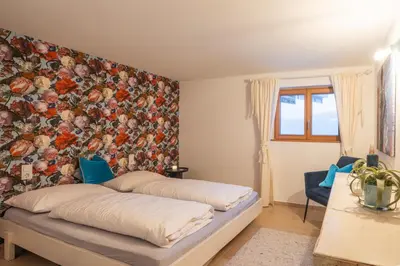 Ein Bett oder Betten in einem Zimmer der Unterkunft Chalet Urban