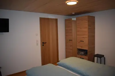 Ein Bett oder Betten in einem Zimmer der Unterkunft Ferienwohnung BergTraum