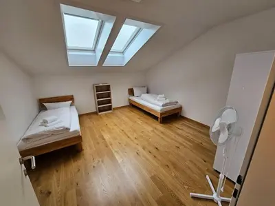 Ein Bett oder Betten in einem Zimmer der Unterkunft Ach18, Bregenz, Vorarlberg Apartments