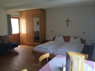 Ein Bett oder Betten in einem Zimmer der Unterkunft Gästehaus Bernhard