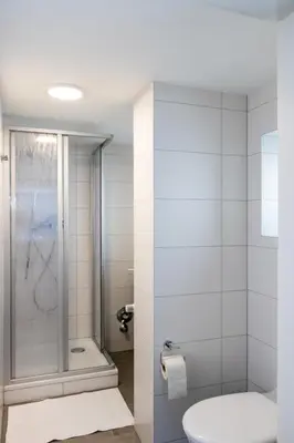 Ein Badezimmer in der Unterkunft STADTHAUS M42 Dornbirn - Apartment Top 4
