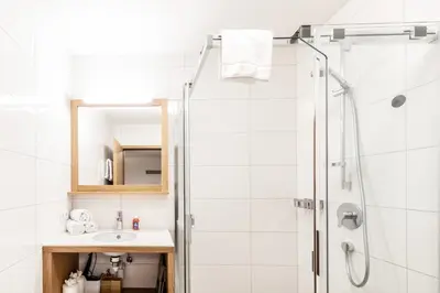 Ein Badezimmer in der Unterkunft Berg Aparts Faschina - 09
