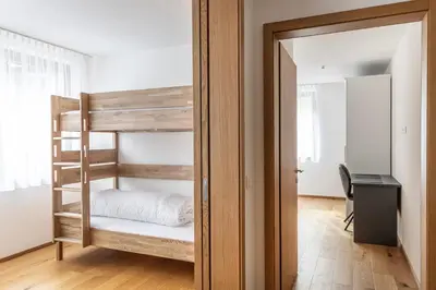 Ein Bett oder Betten in einem Zimmer der Unterkunft Berg Aparts Faschina - 05 - b42791