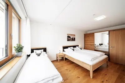 Ein Bett oder Betten in einem Zimmer der Unterkunft Berg Aparts Faschina - 02 - b42789