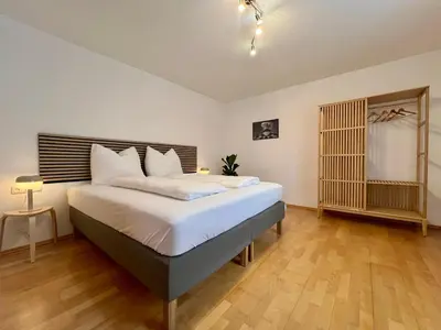 Ein Bett oder Betten in einem Zimmer der Unterkunft Stadthaus 1911