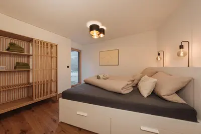 Ein Bett oder Betten in einem Zimmer der Unterkunft Ferienwohnung Schiebakopf