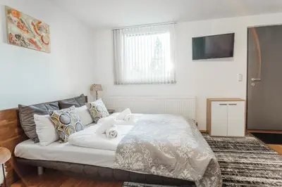 Ein Bett oder Betten in einem Zimmer der Unterkunft Cocoon Studio