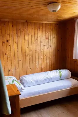 Ein Bett oder Betten in einem Zimmer der Unterkunft Haus OmaGermana