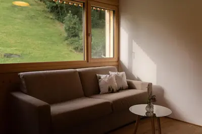 Ein Sitzbereich in der Unterkunft Haus Kanabe