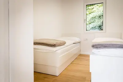 Ein Bett oder Betten in einem Zimmer der Unterkunft Die Bludenzerin