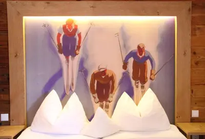 Ein Bett oder Betten in einem Zimmer der Unterkunft Alpen Suites Brandnertal