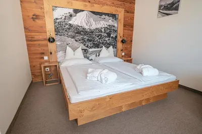 Ein Bett oder Betten in einem Zimmer der Unterkunft Alpen Suites Brandnertal