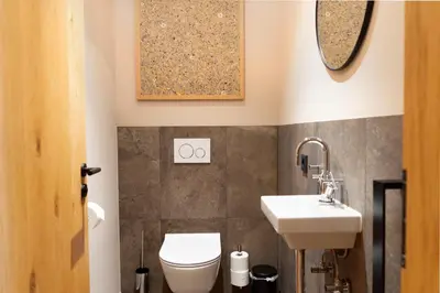Ein Badezimmer in der Unterkunft Heimat 1495m Appartement TYP 2