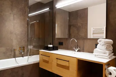 Ein Badezimmer in der Unterkunft Heimat 1495m Appartement TYP 6