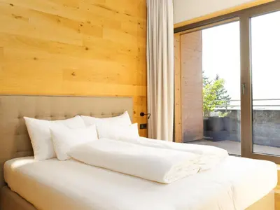 Ein Bett oder Betten in einem Zimmer der Unterkunft Wohnung in Schröcken beim Ski Arlberg