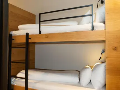 Ein Bett oder Betten in einem Zimmer der Unterkunft Wohnung in Schröcken beim Ski Arlberg