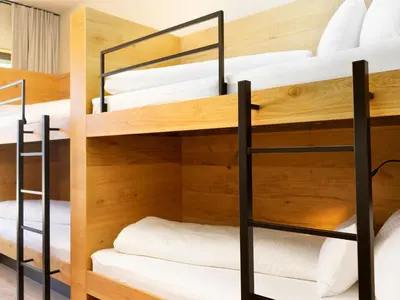 Ein Bett oder Betten in einem Zimmer der Unterkunft Wohnung in Schröcken nahe Ski Arlberg
