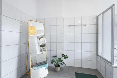 Ein Badezimmer in der Unterkunft Stylische Altbauwohnung Bregenz am See