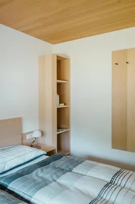 Ein Bett oder Betten in einem Zimmer der Unterkunft Haus Margreth