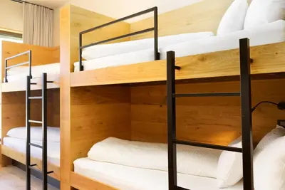 Ein Etagenbett oder Etagenbetten in einem Zimmer der Unterkunft Heimat 1495 Appartements - TYP 7