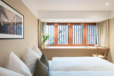 Ein Bett oder Betten in einem Zimmer der Unterkunft Hotel Johann