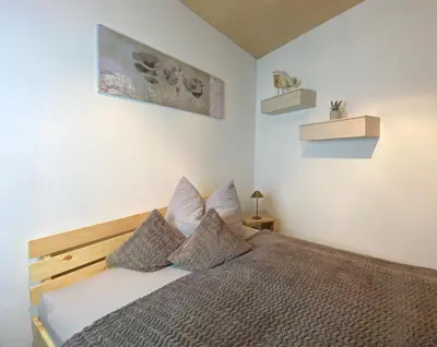 Ein Bett oder Betten in einem Zimmer der Unterkunft Ferienwohnung Jochum-Pfeiffer